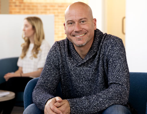 Headshot of Nick Megjugorac, PhD